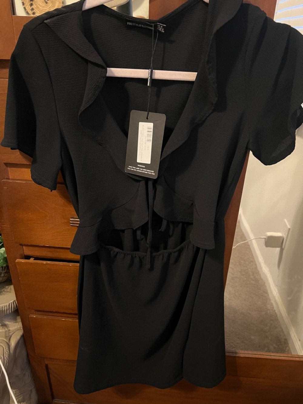 PrettyLittleThing Black Ruffle-Front Mini Dress - Picture 2 of 9